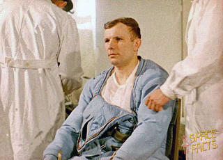 Post -flight, Gagarin is attended by the medical team