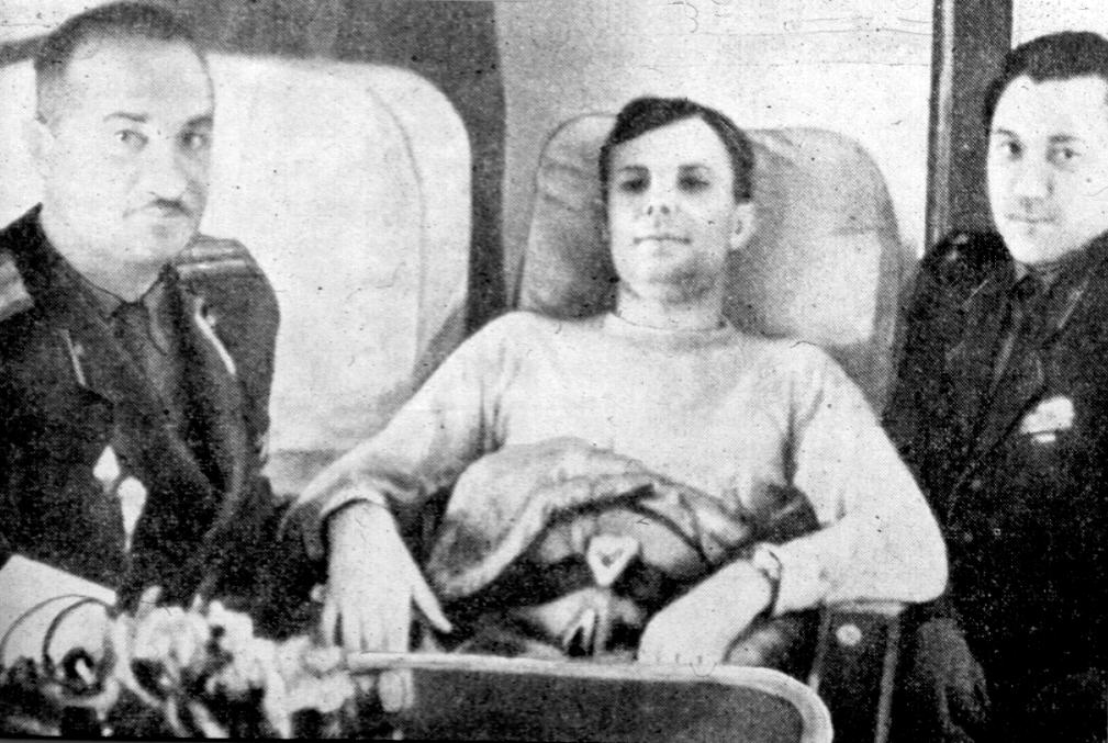 Gagarin rests aboard the aircraft taking him to a well-earned rest and recovery.
