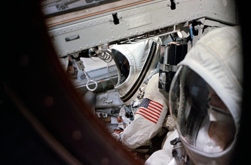 Borman and Lovell photographed inside the spacecraft prior to launch