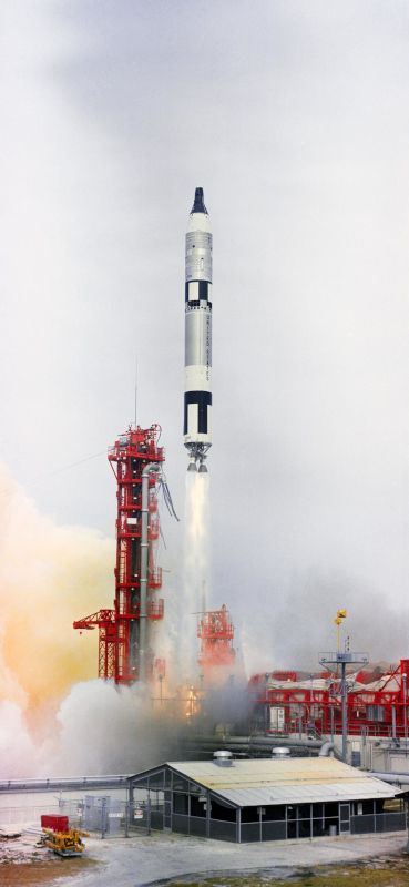 a column of fire and smoke as Gemini 7 launches from the Pad at Cape Kennedy