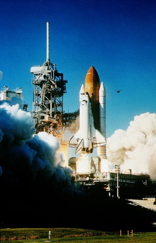 Space Shuttle Discovery blasts off from the launch pad at the start of the STS-95 mission in 1998