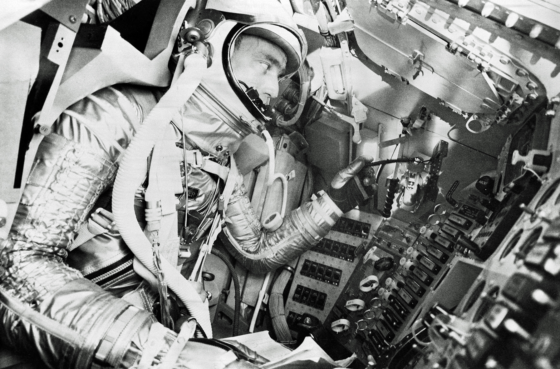 Project Mercury astronaut M. Scott Carpenter, prime pilot for the United States second manned orbital flight, undergoes a simulated mission in the procedures trainer at Langley Air Force Base, Virginia, headquarters for the National Aeronautics and Space Administration's Manned Spacecraft Center.