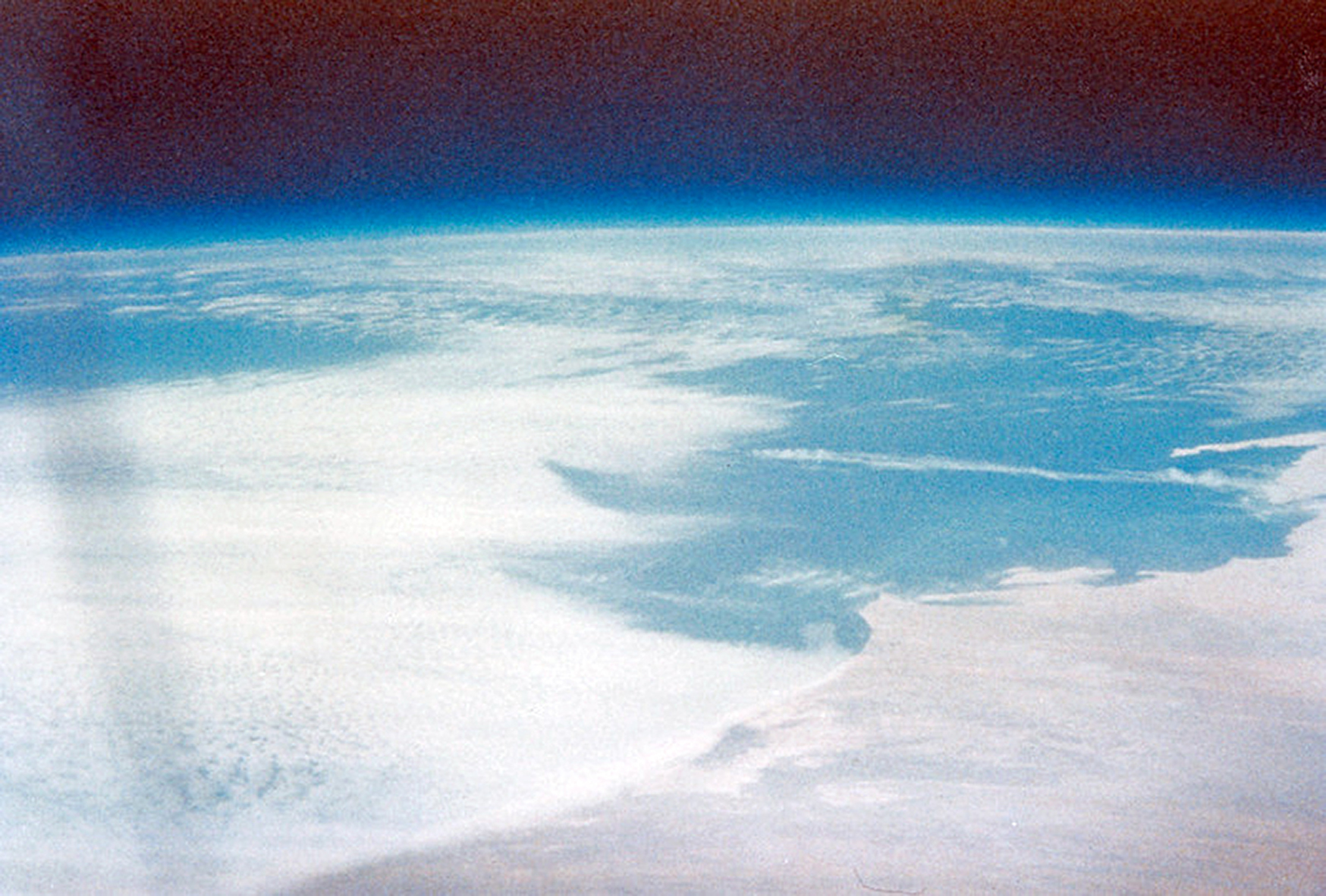 One of the Earth and sky images taken by Carpenter during his mission