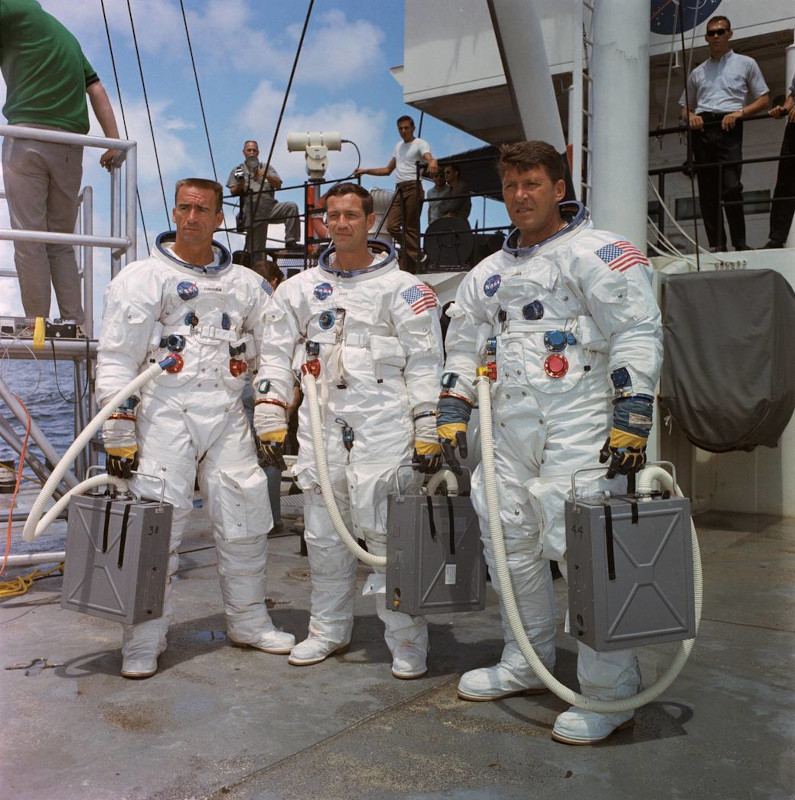 Apollo 7 crew Cunningham, Eisele and Schirra are dressed in their space suits for water egress training in the Gulf of Mexico