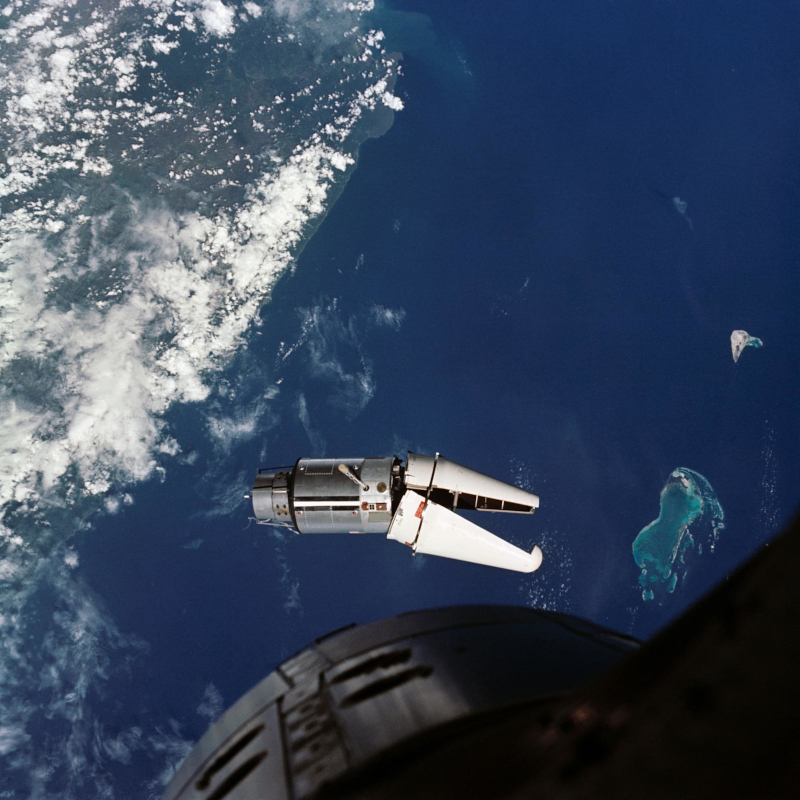 Orbital view of the Gemini 9 rendezvous target with its protective cover still attached
