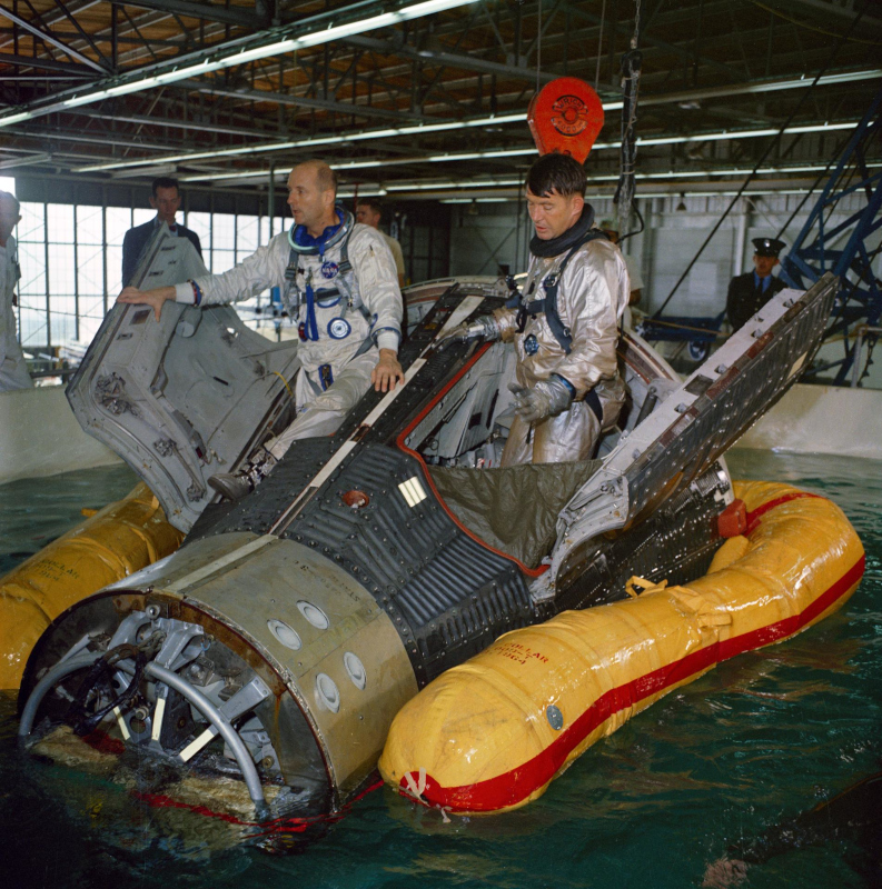 The Gemini 6 crew during water egress training at Ellington AFB